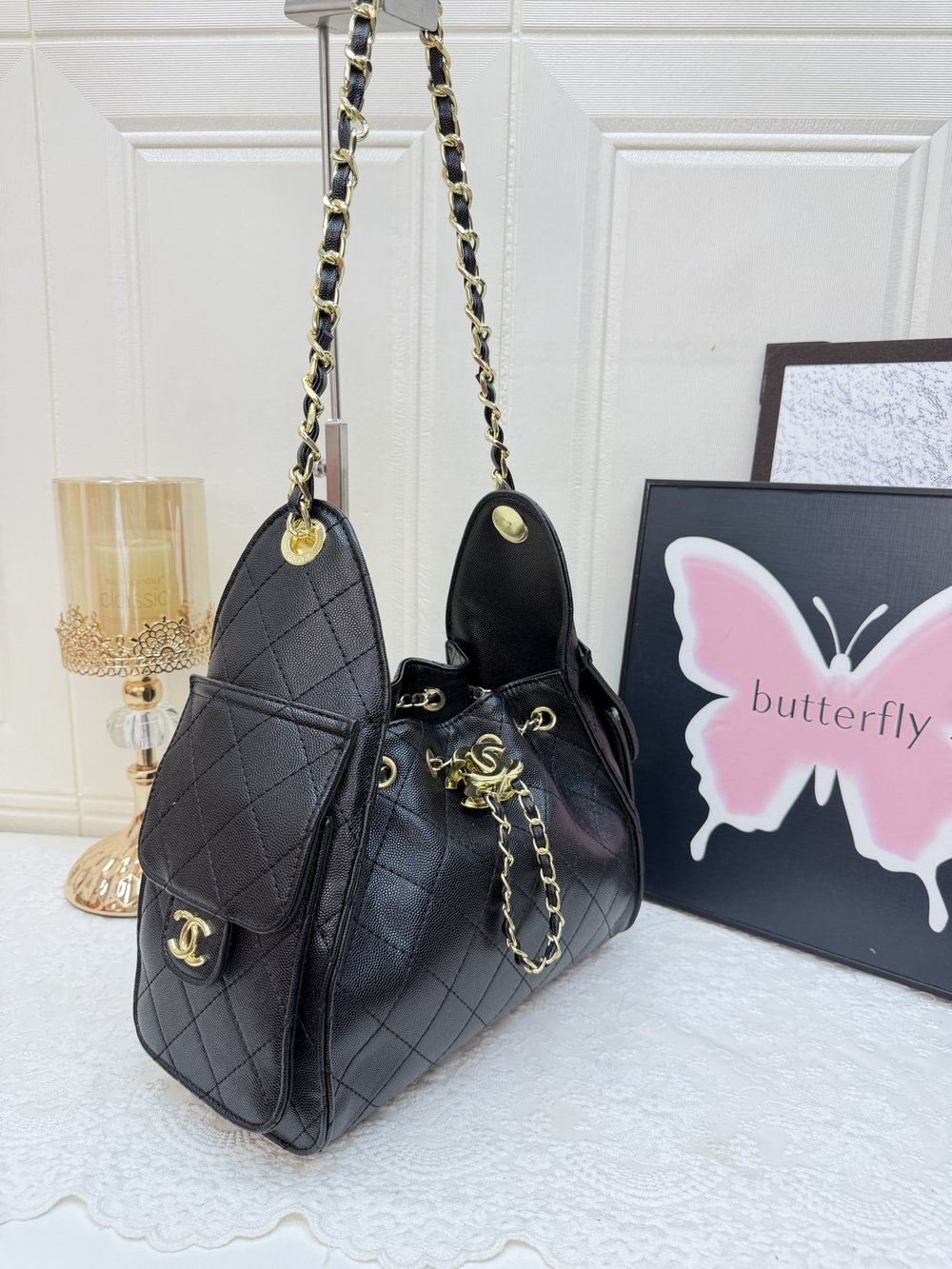 Black Quilted Shoulder Bag with Gold Chain Details